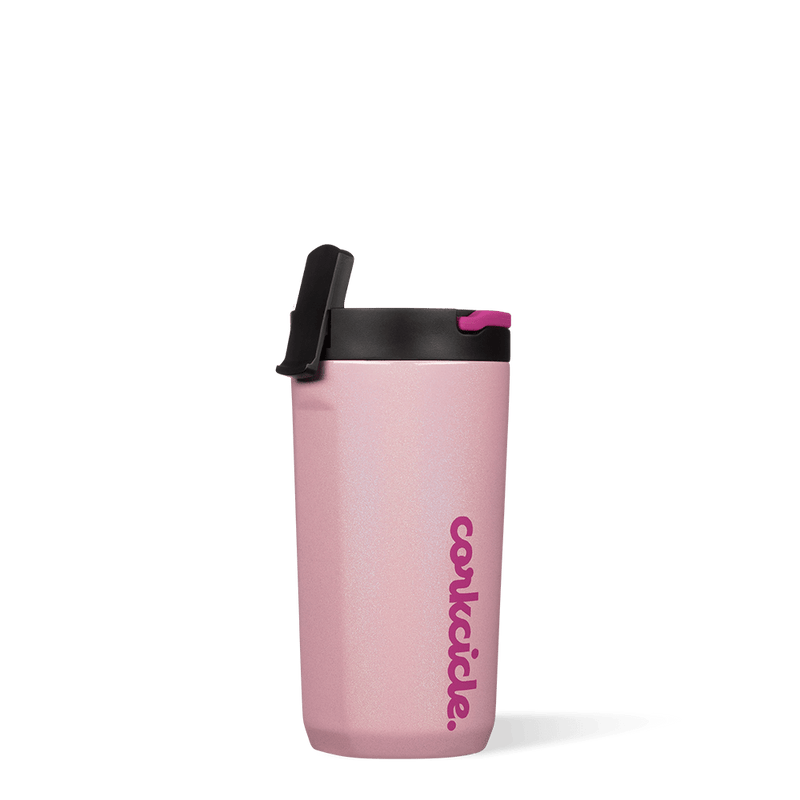Cotton Candy Cup is a pale pink silicone cup with "Corkcicle" written vertically in pink. The cap part is black and the handle is pink. On the cap part, the drinking straw is raised and the cup is upright.